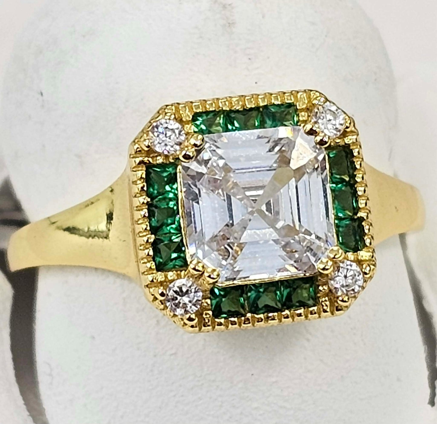 925 Ring with CZs and Gold Coating.